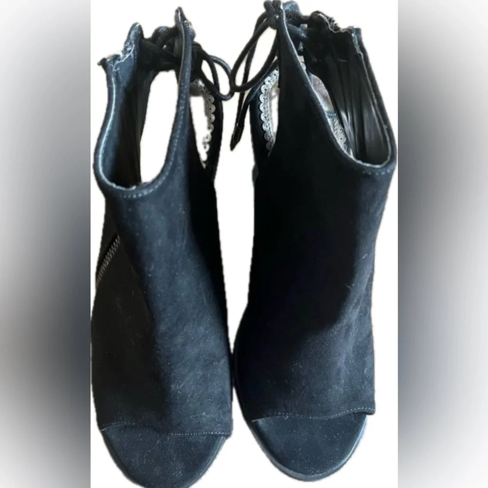 Black Peep Toe Booties with side zipper and chunky heel. NWOT. Women’s size 8.5